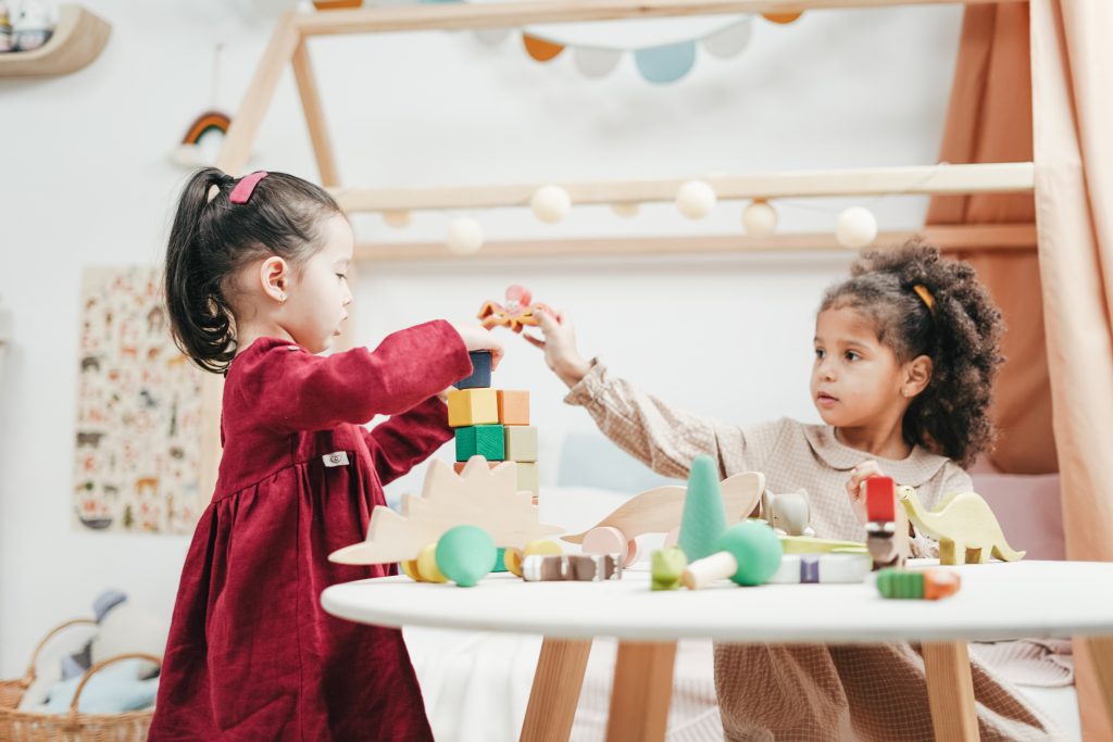 Children play with building blocks