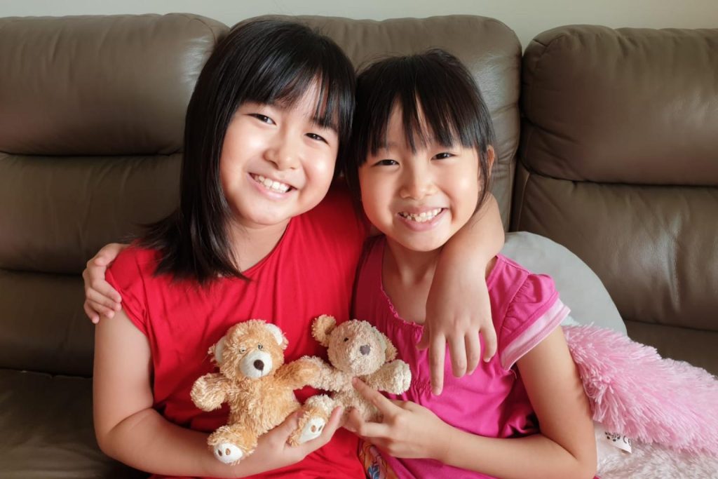 Sisters Celine and Claudine Ng enjoyed spending time together. PHOTO: COURTESY TO CHIA JENNY