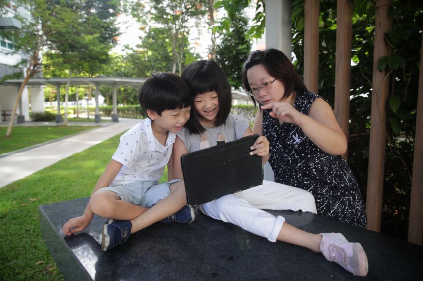 Ms Cheryl Chan with her seven-year-old son Reagan (left) and daughter Raequelle, eight. ST PHOTO: GIN TAY